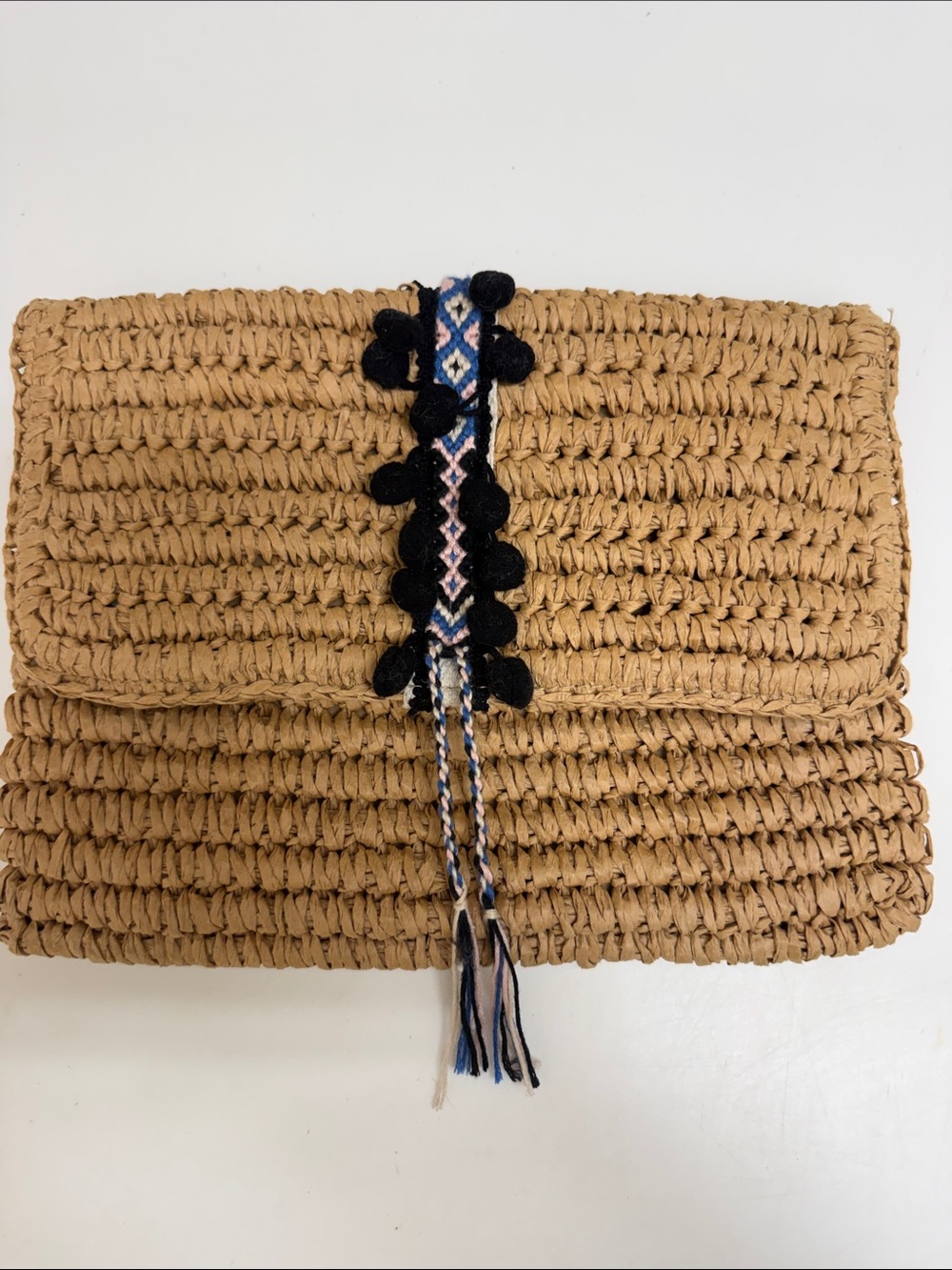 Fallon & Royce Woven Straw Clutch with Black Pom Trim